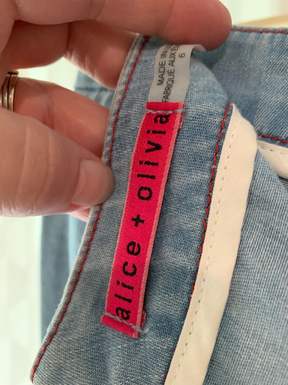 Alice + Olivia Light Blue Jeans with Bright Pink Trim